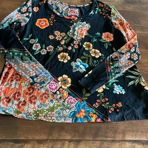 Brilliantly colored print on black.  Johnny Was flare style long sleeve top.